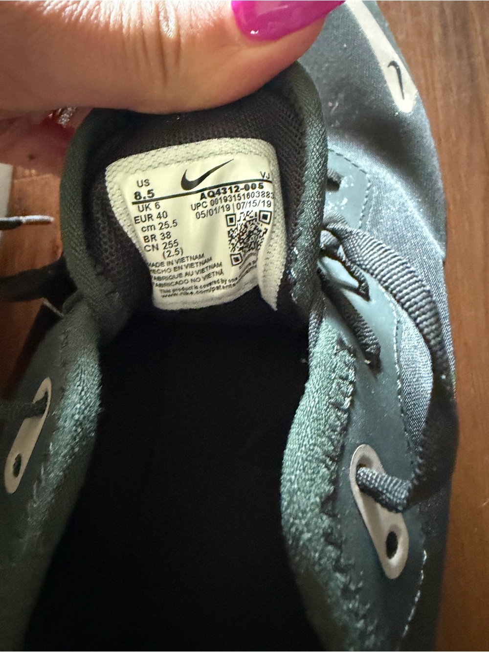 Nike Kids Black Low-Top Sneakers with White Swoosh